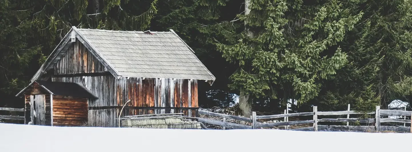 Snowy barn in winter